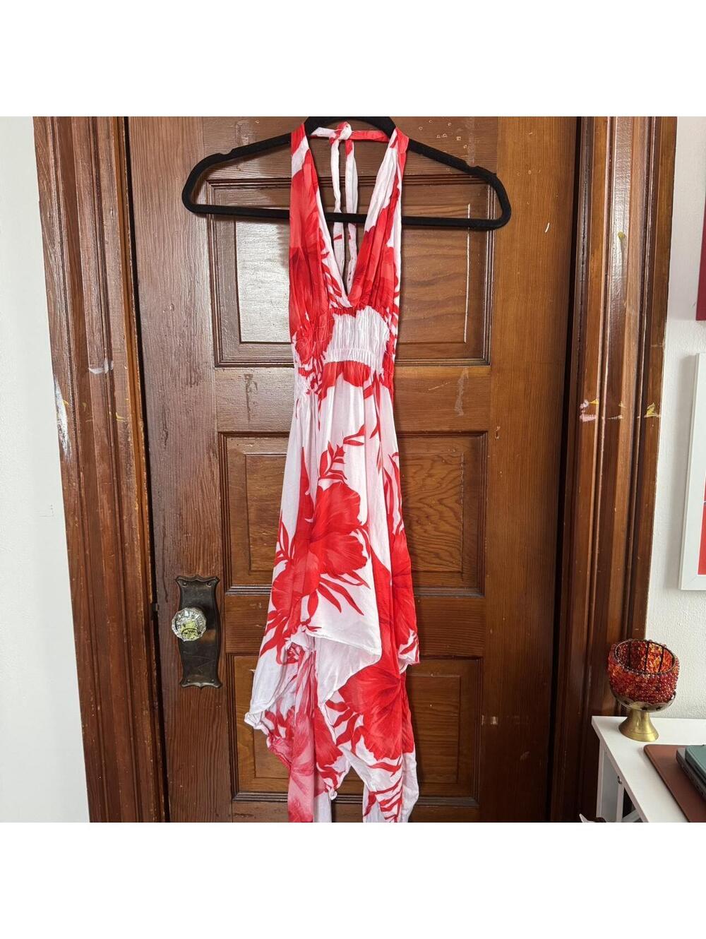 Red and white halter neck dress with a flowy, asymmetrical design size small